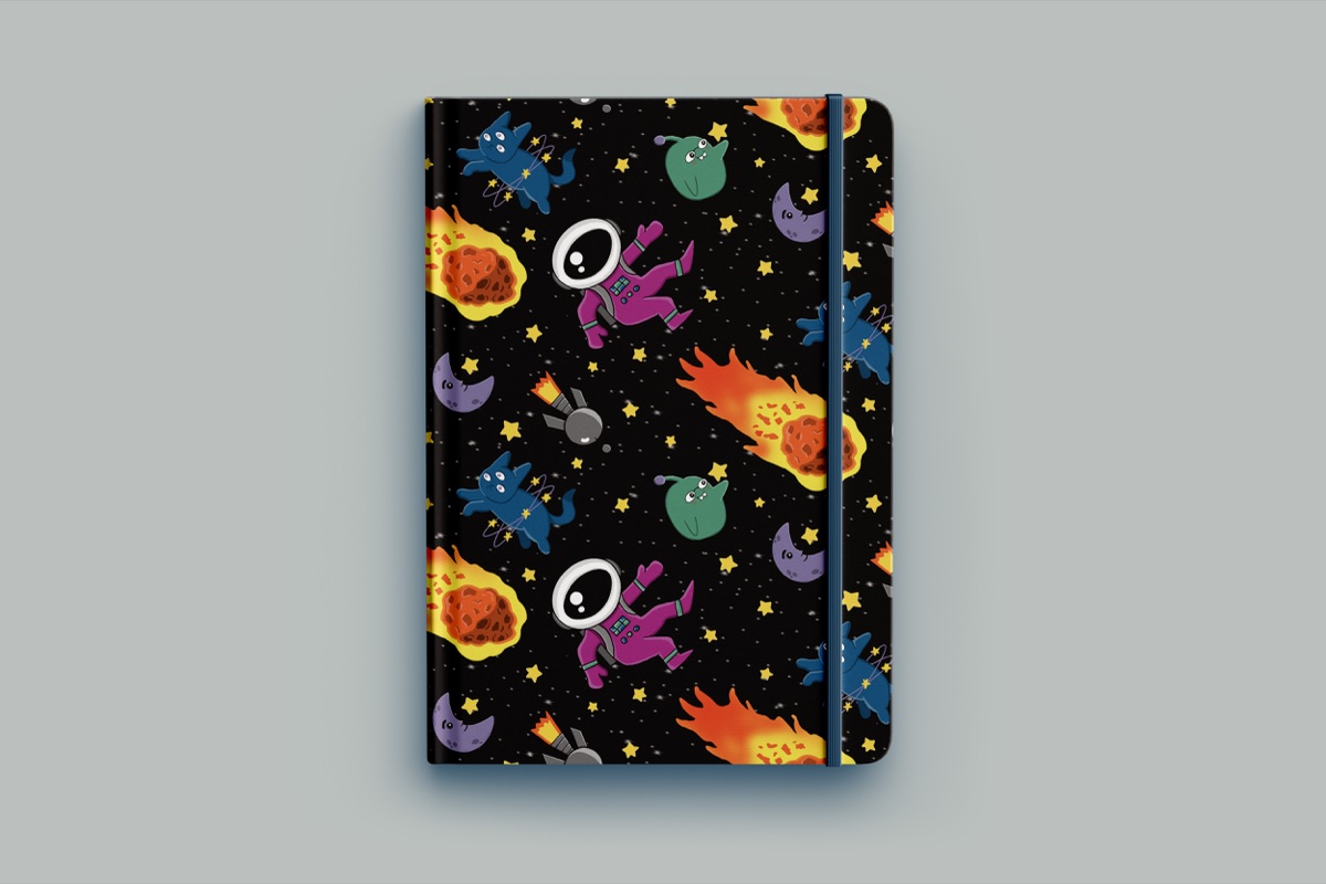 Black notebook with the Galactic Boom meteor and astronaut repeat pattern